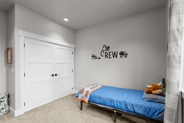 bedroom with recessed lighting, baseboards, and carpet floors