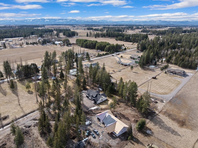 bird's eye view with a mountain view and a rural view