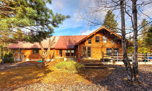 17 Mountain View Rd, Trout Creek, MT 59874 - rear view of property featuring log siding, a metal roof, and a deck