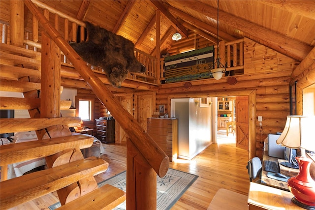 17 Mountain View Rd, Trout Creek, MT 59874 - staircase with high vaulted ceiling, a wooden ceiling with exposed beams, hardwood / wood-style floors, and rustic walls