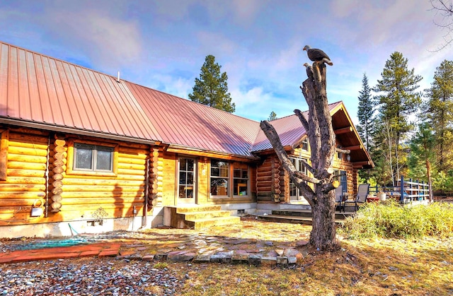 17 Mountain View Rd, Trout Creek, MT 59874 - rear view of property featuring log exterior and a metal roof