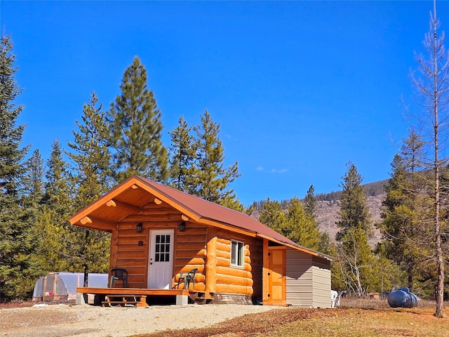 17 Mountain View Rd, Trout Creek, MT 59874 - log home featuring an outbuilding and a metal roof