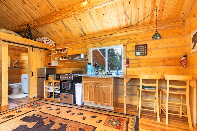 17 Mountain View Rd, Trout Creek, MT 59874 - kitchen featuring wood ceiling, freestanding refrigerator, range hood, light wood-style floors, and range with gas stovetop