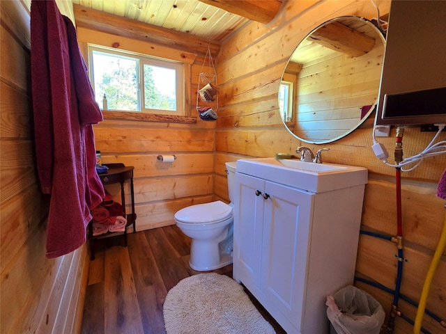 17 Mountain View Rd, Trout Creek, MT 59874 - half bathroom featuring vanity, wood finished floors, a wooden ceiling with exposed beams, and wood walls