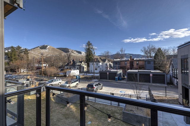 balcony with a mountain view and a residential view