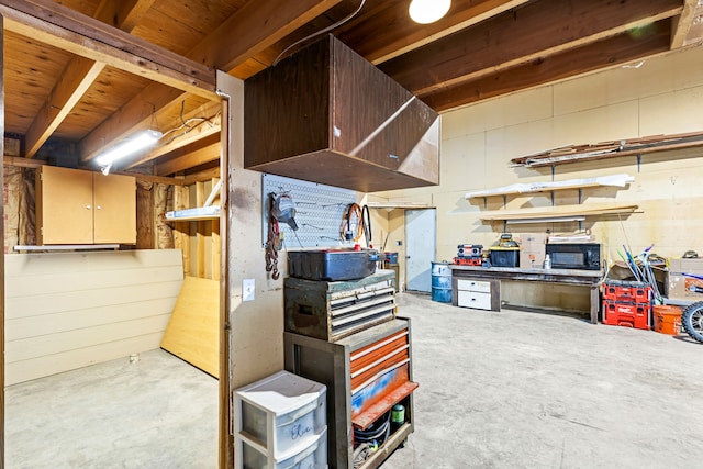 basement with a workshop area