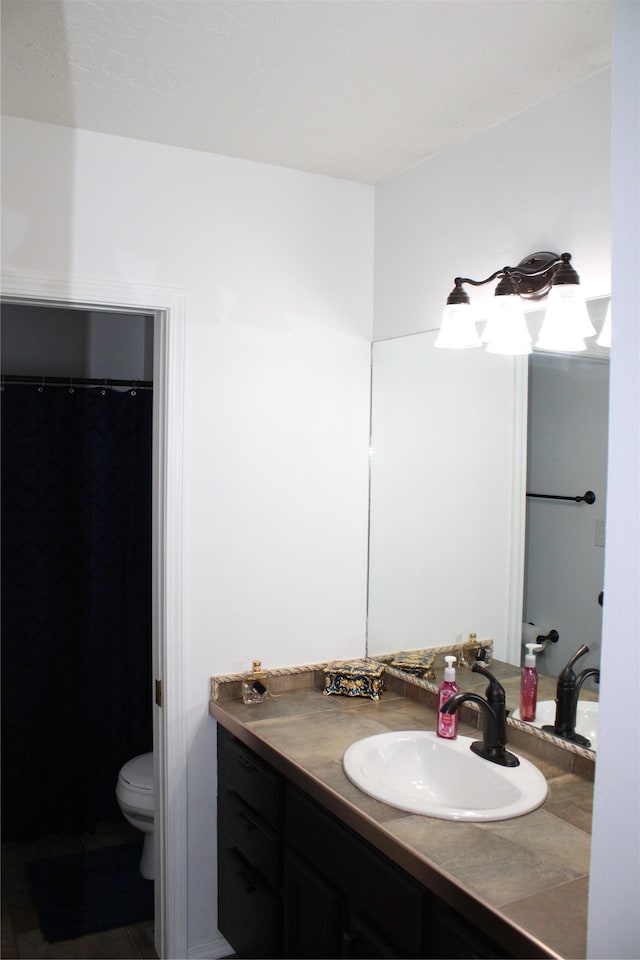3004 Green Cir, Butte, MT 59701 - bathroom featuring vanity and toilet