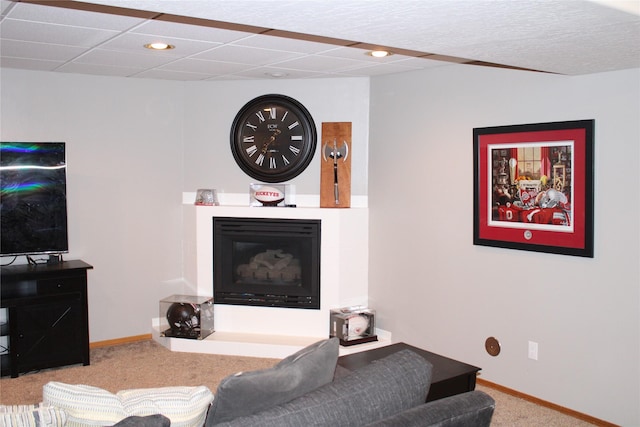 3004 Green Cir, Butte, MT 59701 - carpeted living area with baseboards and a glass covered fireplace