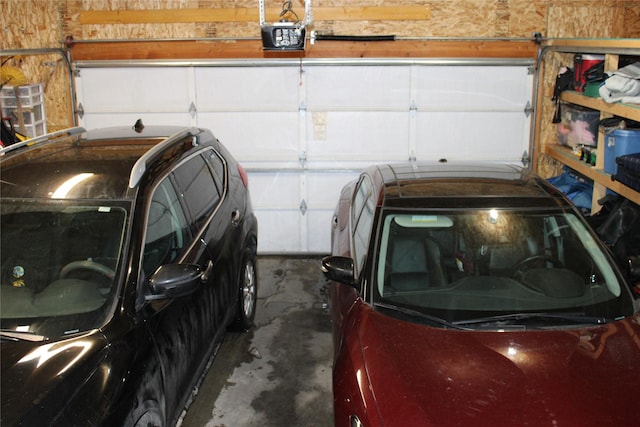 3004 Green Cir, Butte, MT 59701 - garage featuring a garage door opener