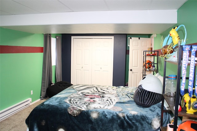 3004 Green Cir, Butte, MT 59701 - carpeted bedroom featuring a baseboard radiator and a closet