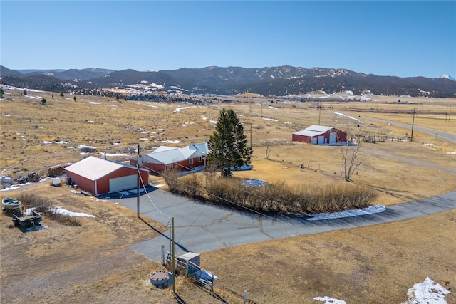 bird's eye view with a rural view and a mountain view