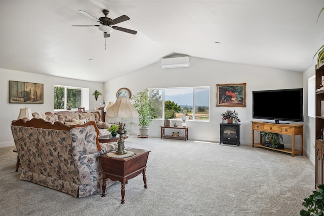 carpeted living room featuring baseboards, a ceiling fan, lofted ceiling, and a wall unit AC