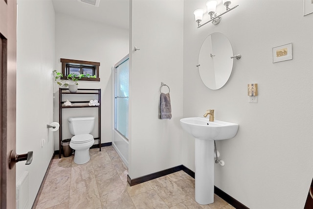 bathroom featuring visible vents, shower / washtub combination, toilet, and baseboards