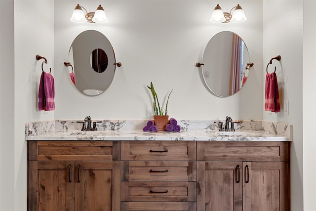 full bath featuring a sink and double vanity