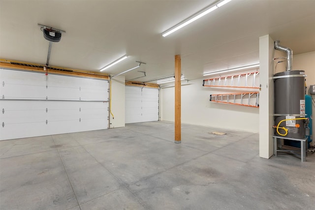 garage with secured water heater and a garage door opener