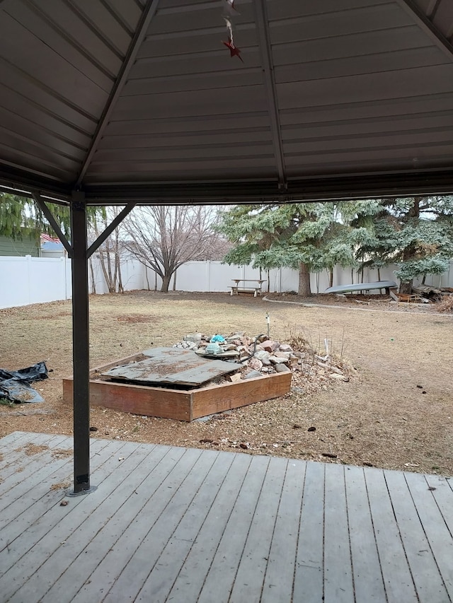 deck with a gazebo and fence