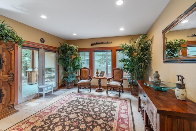 living area featuring a wealth of natural light and recessed lighting