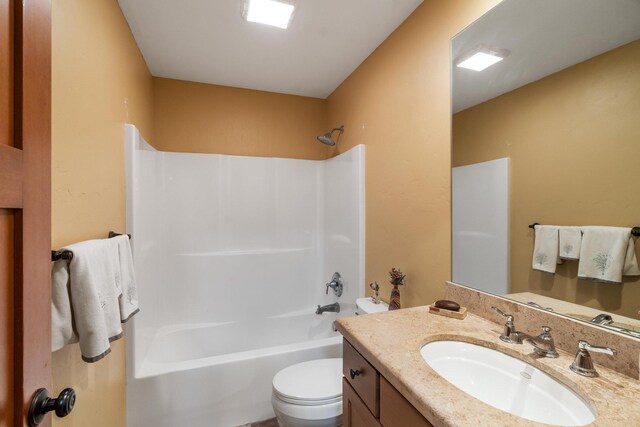 full bathroom with vanity, toilet, and tub / shower combination