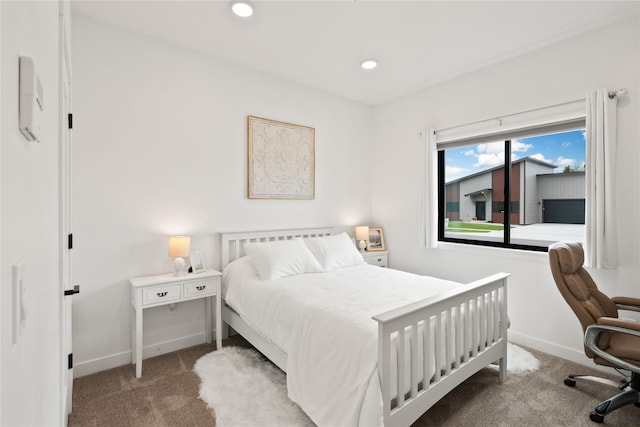 carpeted bedroom with recessed lighting and baseboards