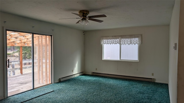 carpeted empty room featuring baseboard heating, plenty of natural light, ceiling fan, and a baseboard radiator