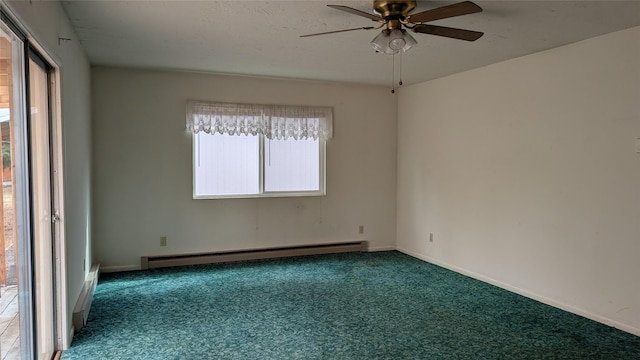 carpeted empty room with a ceiling fan, baseboards, and baseboard heating