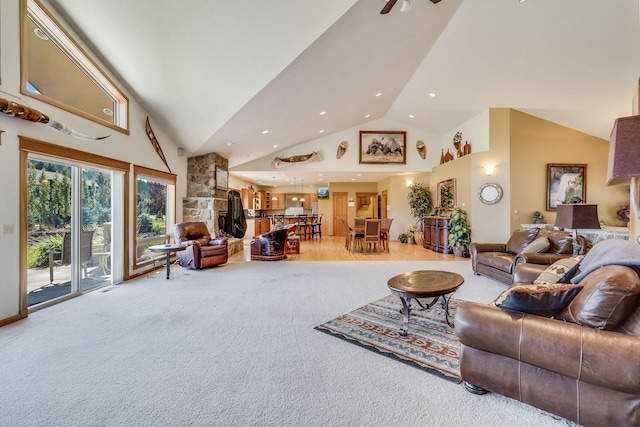 living room featuring carpet flooring, recessed lighting, and high vaulted ceiling