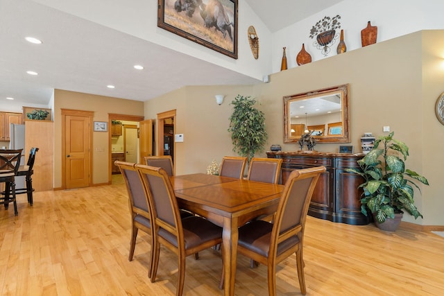 dining area featuring recessed lighting and light wood finished floors