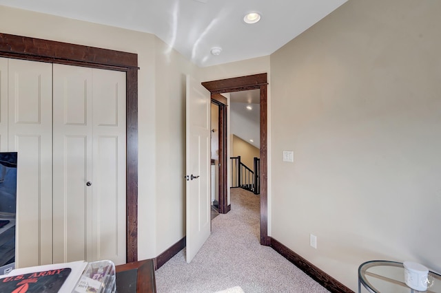 bedroom featuring recessed lighting, baseboards, a closet, and light carpet