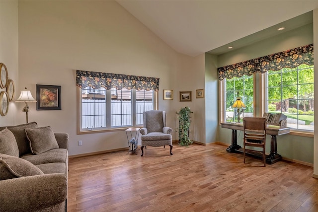 845 S California St, Helena, MT 59601 - living area featuring high vaulted ceiling, healthy amount of natural light, wood finished floors, and recessed lighting