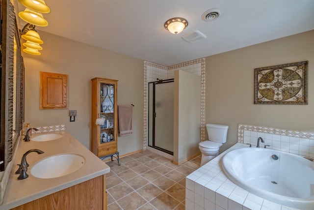 full bathroom featuring visible vents, a shower stall, a garden tub, and a sink