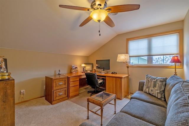 home office featuring ceiling fan, lofted ceiling, and light carpet