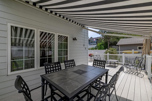 845 S California St, Helena, MT 59601 - wooden deck with outdoor dining space