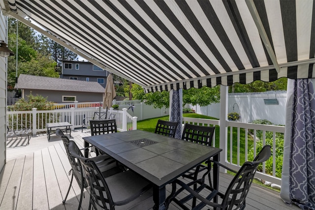 845 S California St, Helena, MT 59601 - deck with outdoor dining space and a fenced backyard