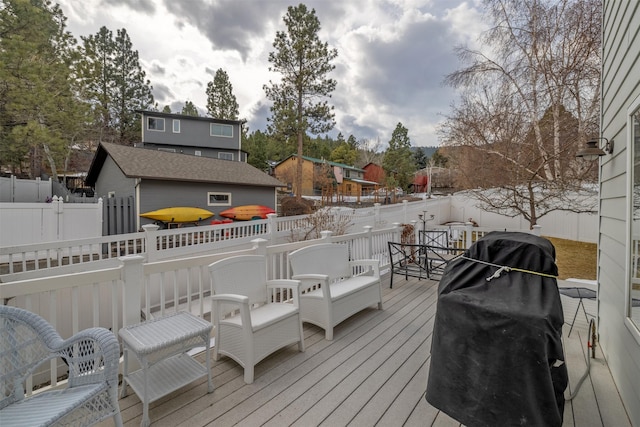 deck featuring grilling area and fence private yard