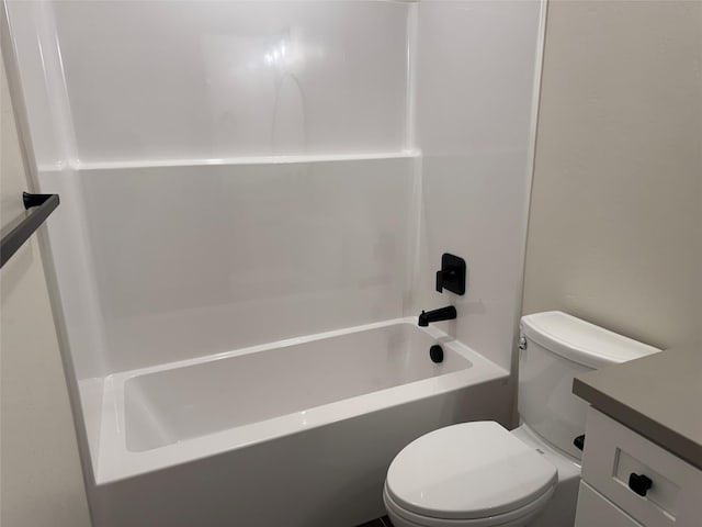 full bathroom with toilet and vanity