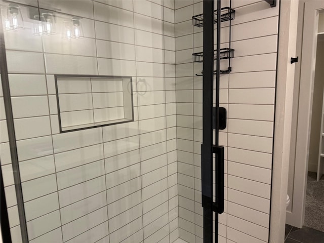 full bath with a shower stall