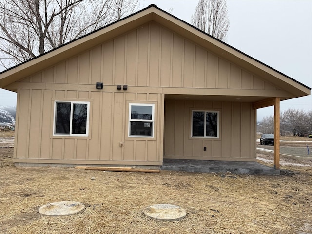 back of property featuring board and batten siding