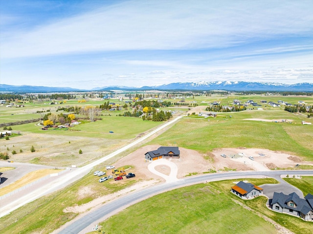 drone / aerial view featuring a mountain view