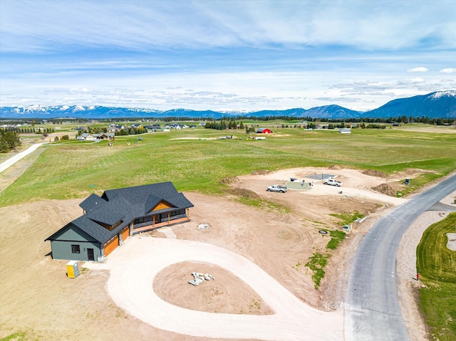 bird's eye view with a mountain view