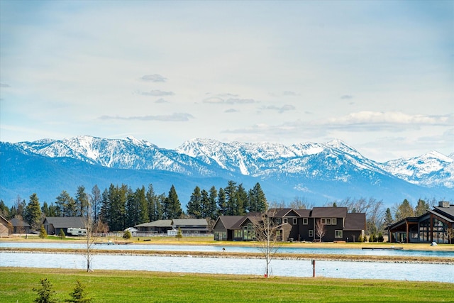 view of mountain feature with a water view