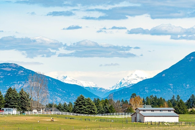 mountain view featuring a rural view