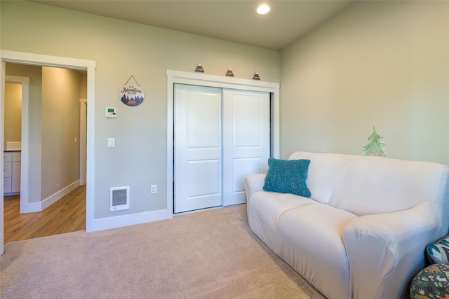 sitting room featuring recessed lighting, visible vents, carpet floors, and baseboards