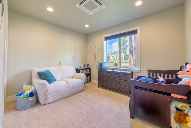 bedroom with recessed lighting, visible vents, light colored carpet, and baseboards