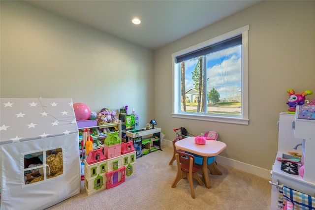 playroom featuring recessed lighting, baseboards, and carpet flooring