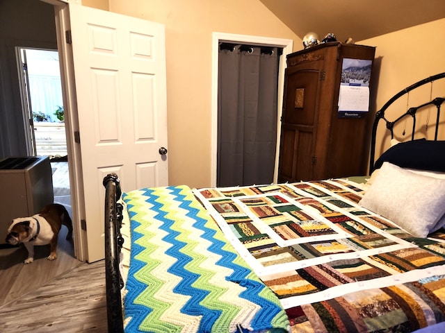 bedroom featuring wood finished floors