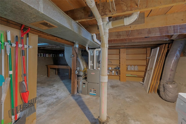 unfinished basement featuring visible vents