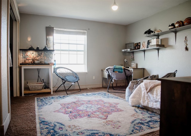 carpeted bedroom with baseboards