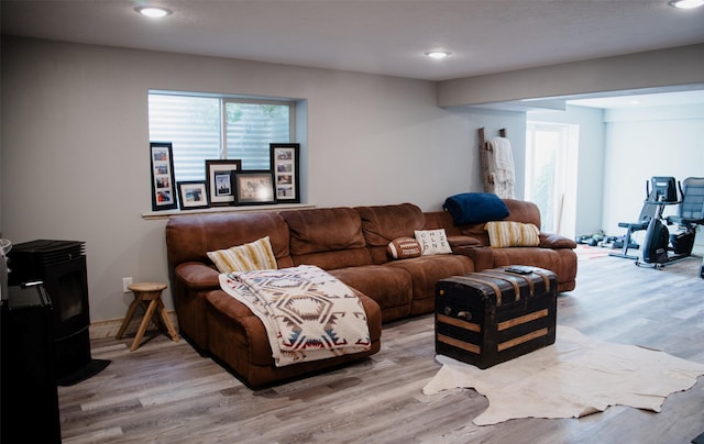 living room with recessed lighting and wood finished floors