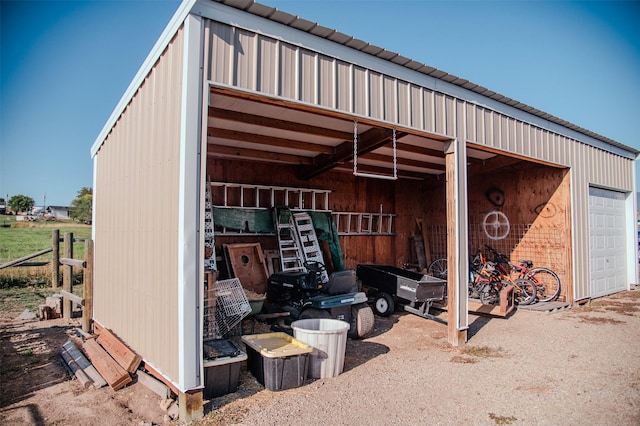 view of outbuilding featuring an outbuilding and a garage