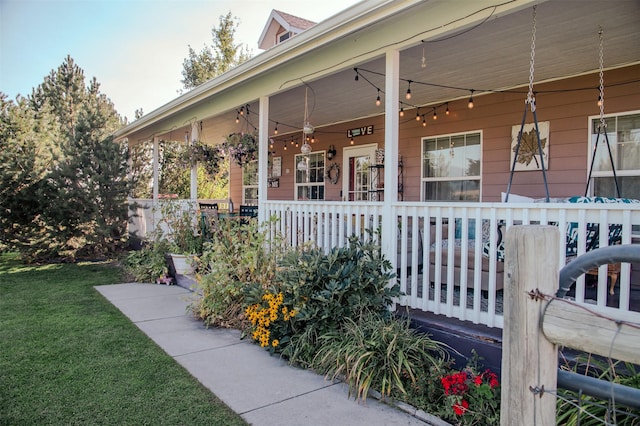 4735 Drake Ln, Stevensville, MT 59870 - property entrance with a lawn and covered porch